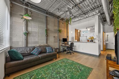 Living room with a high ceiling and wood finished