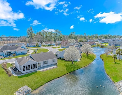 Birds eye view of property with a residential view