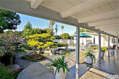 Large atrium great for entertaining with Koi Pond 