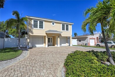 Front of your home with circle paver driveway