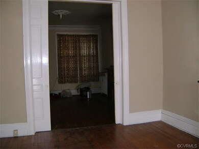 Ceiling Fans, Pocket Doors and Fireplace view into