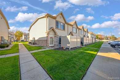 View of side of home featuring a residential view and brick siding