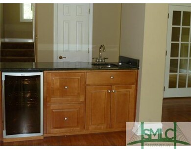Den/Family/Great Room. wet bar with wine cooler in