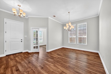 View of entry, office and formal dining.
