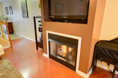 Gas log fireplace w/ nice builtin area for TV