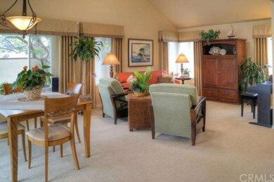 Dining room and living room; soaring ceiling.