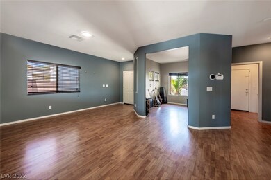 Living Room Open to Dining Room & Den