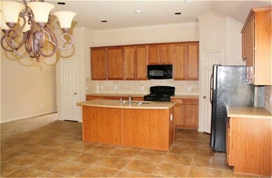 Island for the chef as well as added seating.