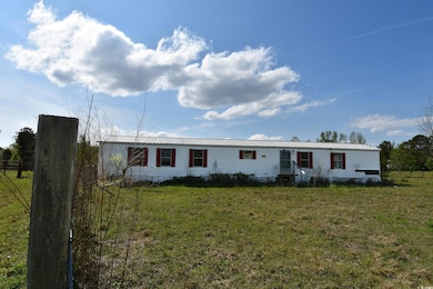 Manufactured / mobile home featuring metal roof an