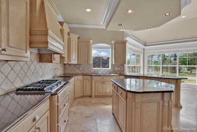 Kitchen with island and lots of natural light