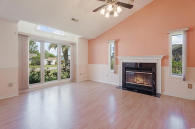 Unfurnished living room with a wealth of natural l