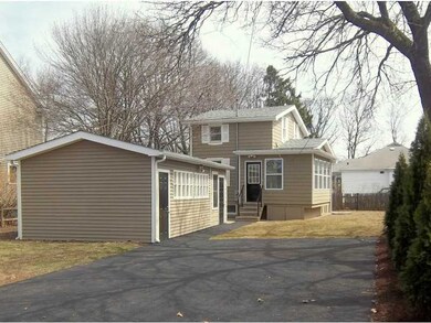 Exterior Front. Showing house & separate Workshop/