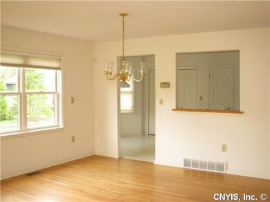Dining Room The kitchen opens into the dining room