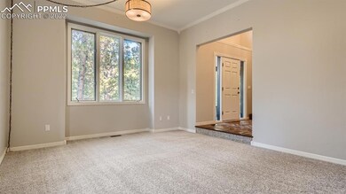This room located right off the entryway can be us
