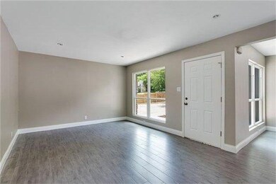 Unfurnished room with wood finished floors
