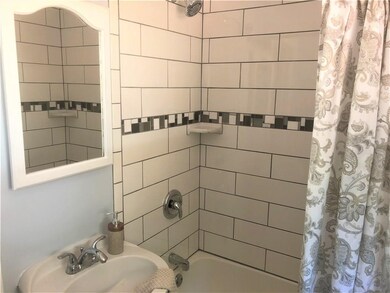 Updated first floor bathroom with beautiful tile s