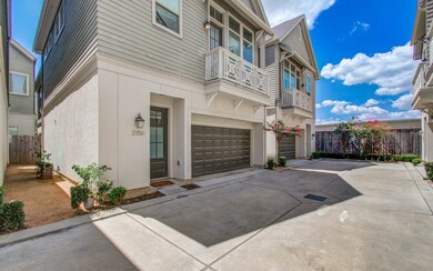 Modern home with 2-car garage and balcony