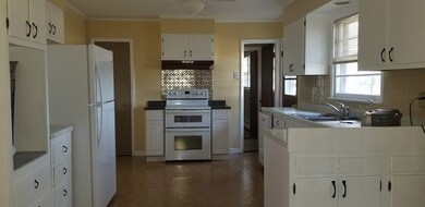 Lots of cabinet storage in this kitchen.  There's