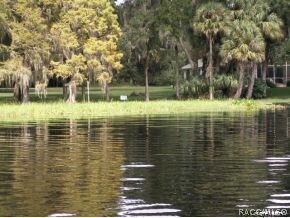 VIEW OF PROPERTY FROM LAKE