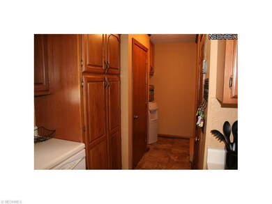 Kitchen pantry with pull outs.