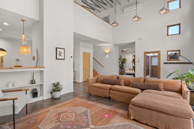 Living room looking toward entry and office
