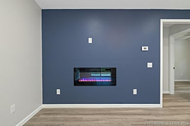 Electric Fireplace can change colors and is a spec