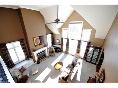 A view of the living room from the open second flo