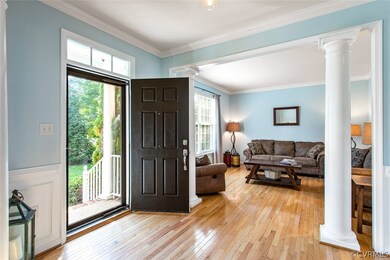 Foyer view from the formal dining room into the fo