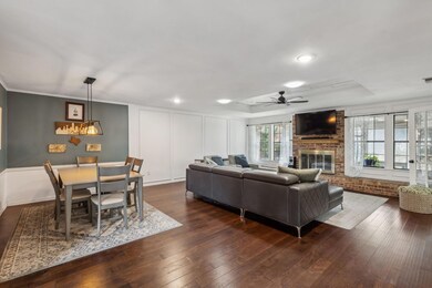 Notice the beautiful floors and tray ceiling.