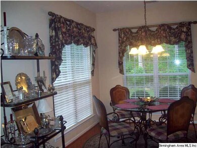Sparkling Eat-In-Kitchen with Gleaming Hardwoods a