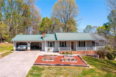 The owners installed the pretty flower beds in the front but being a redneck I would plant tomatoes there.