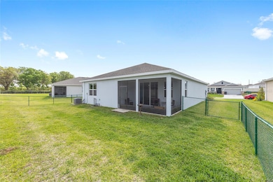 Fully fenced yard and screen enclosed lanai
