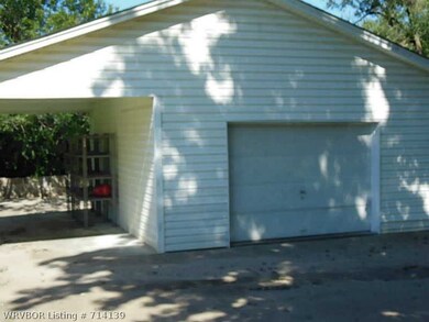 Parking Lot/Garage. Carport/ Garage