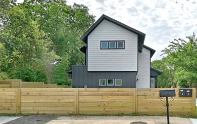 View of side of home featuring board and batten s