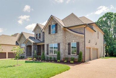 3 Car Garage; Sidewalk Community; Aggregate Drive & walkway.