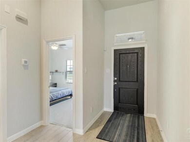 The guest bedrooms are just off the front entry.
