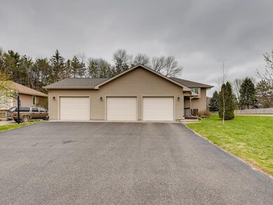 3 Car Attached Garage, Extra Wide Driveway