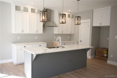 Range Hood, Farmhouse Sink, Custom Built Cabinets
