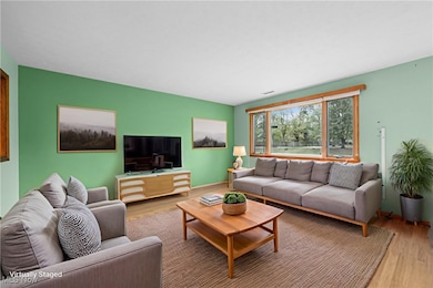 Living area with wood finished floors