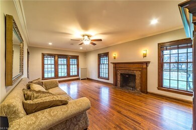 There are gleaming hardwood floors in the living r