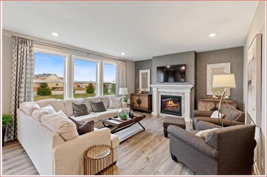 Tile Fireplace centered on the wall for those cozy winter nights. Windows would be 2- wide not 3. Photo for Fire place example only.