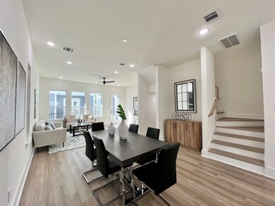 Open floorplan, connecting the kitchen, dining, an