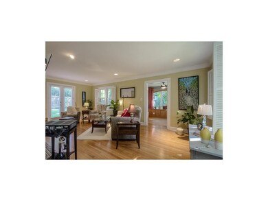 Living Room with view toward office/study in enclo