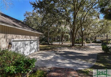 Two car garage with plenty of parking area
