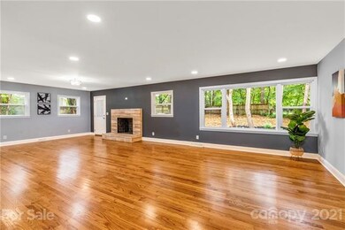 Modern and inviting open living room floor plan wi