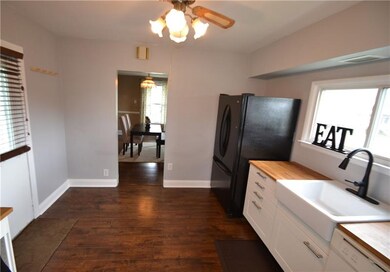 The kitchen opens to the dining room.  Perfect for
