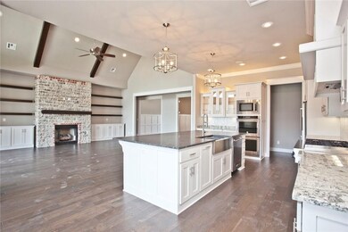 Open floorplan with the kitchen, eat-in area and l