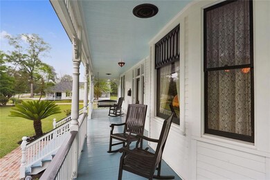 Front porch showing black grates that vent the att