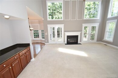 Tons of natural light! & private wooded views