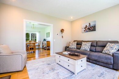 Living room opens to dining